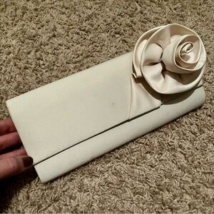 Elegant Cream Clutch with Floral Accent